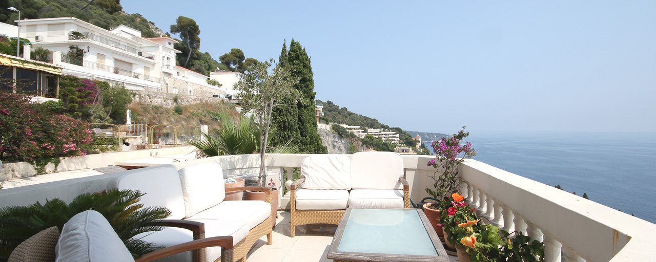 Sunlit terrace overlooking the Mediterranean